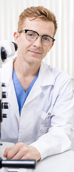 Eye doctor performing an exam